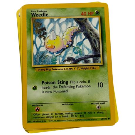 Stack Of Assorted Pokemon Cards