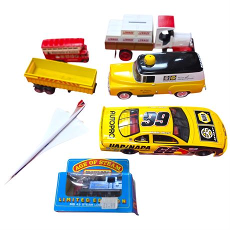 Assorted Toy Vehicles And Boxed Steam Locomotive